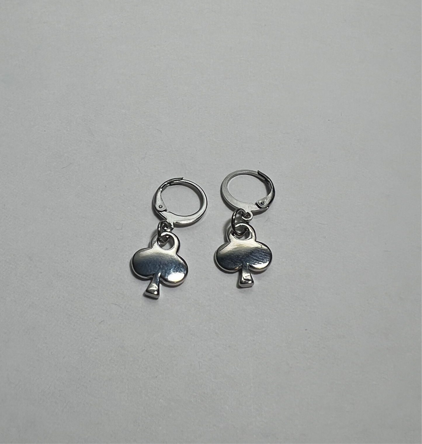 Gold plated club huggie earrings