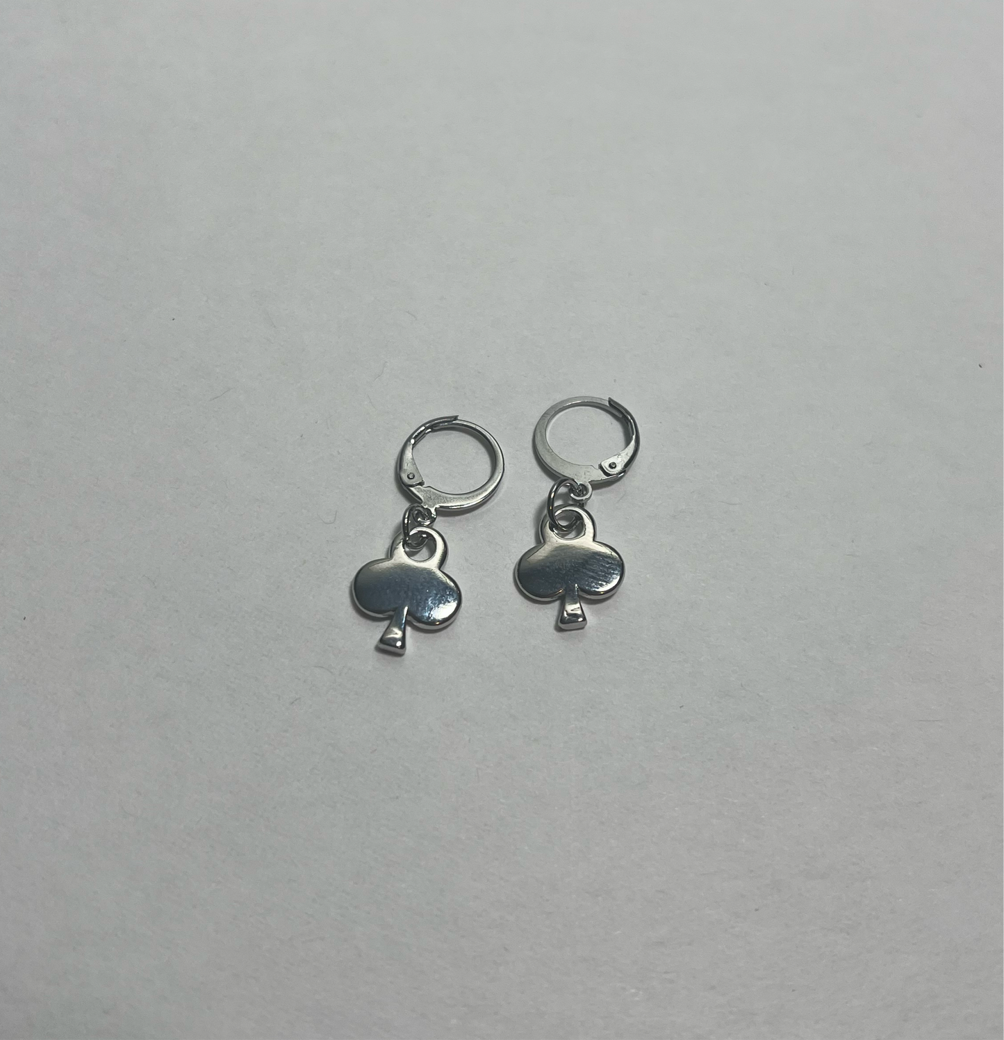 Gold plated club huggie earrings